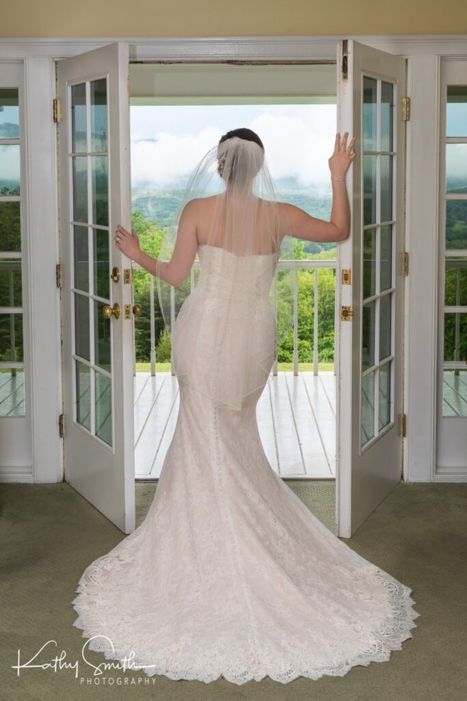 Bride poses in front of a Smoky Mountain view